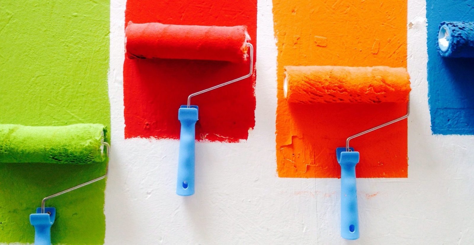 paint rollers on a wall