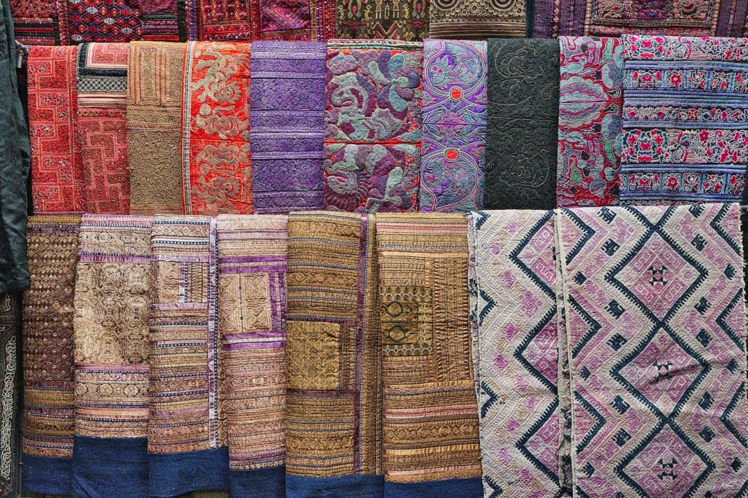 an assortment of various rugs