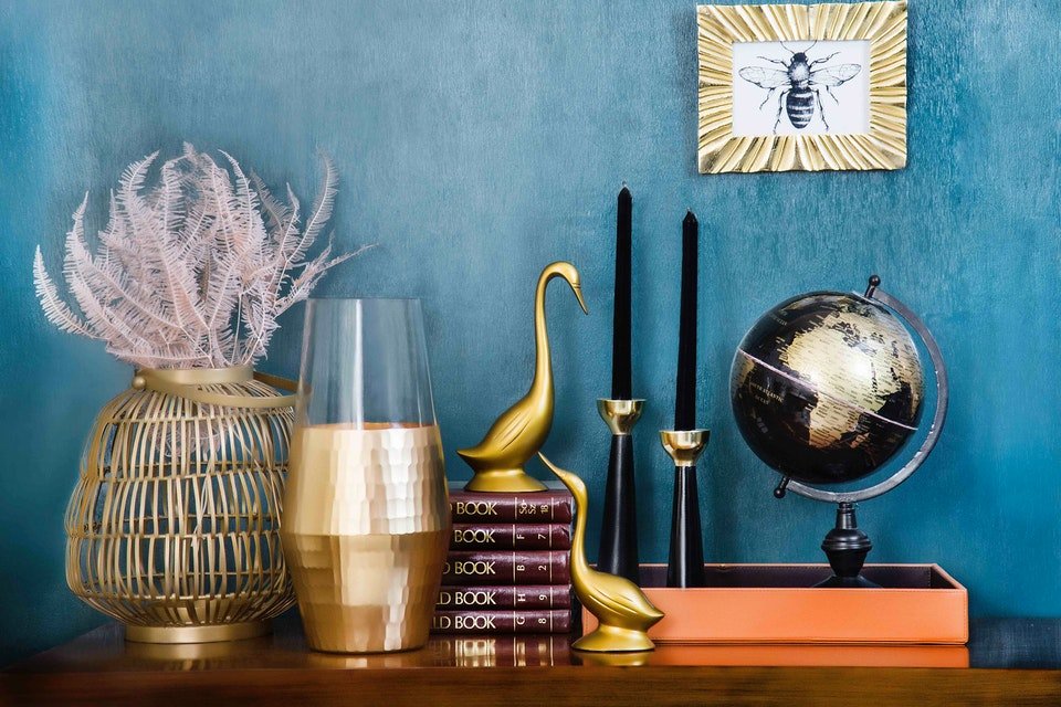 vases, globe and books on the table