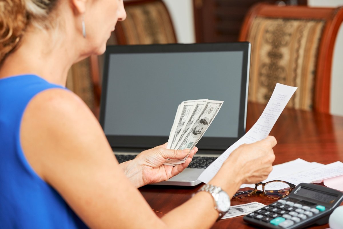 woman counting her budget