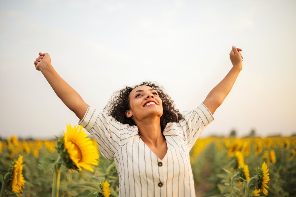 woman cheering after knowing more about the reasons to move to Palo Alto in 2023