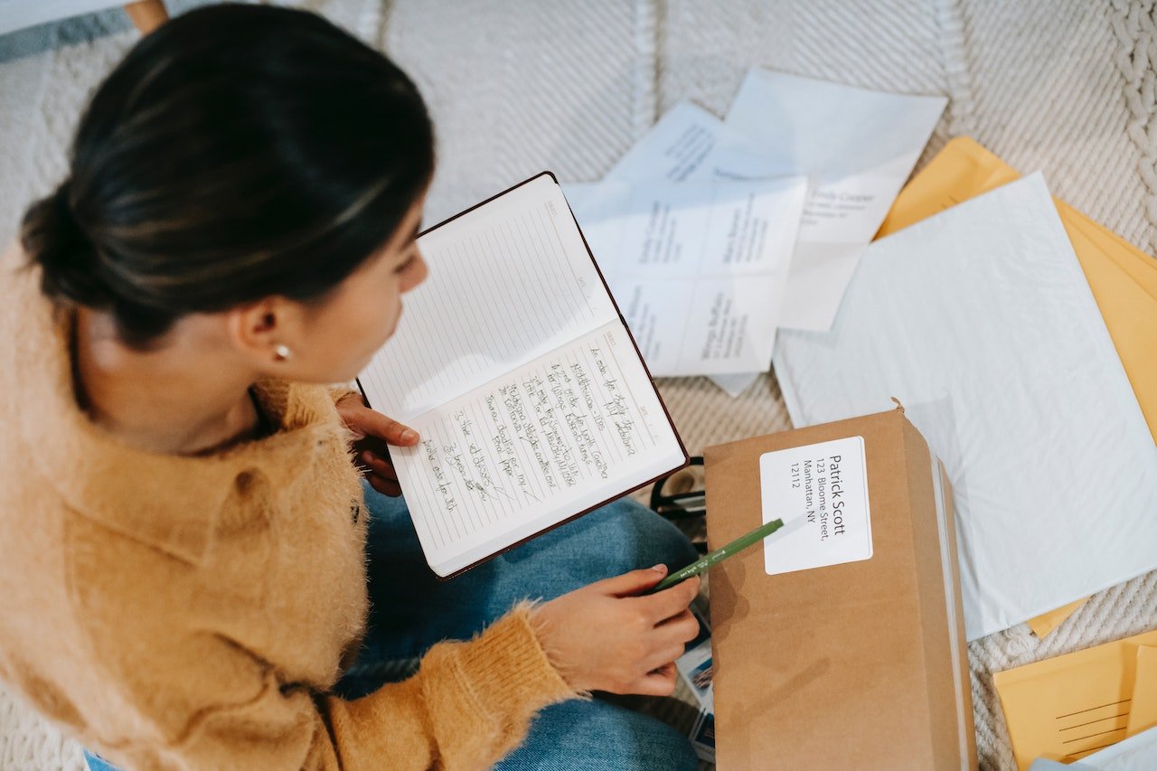 Women researching the benefits of a good labeling system for storage pickup and delivery.