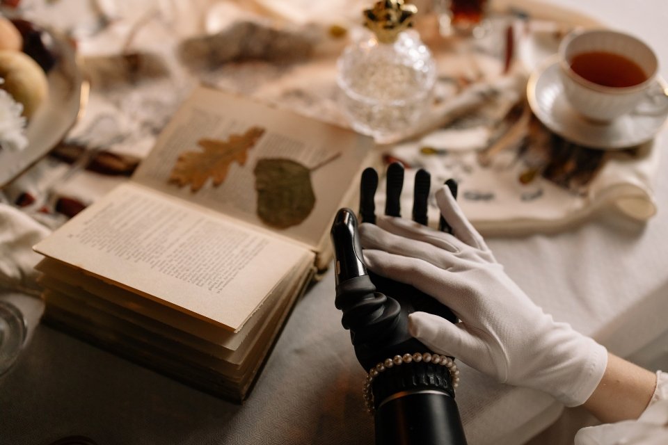 person preparing for relocation, wearing a white glove