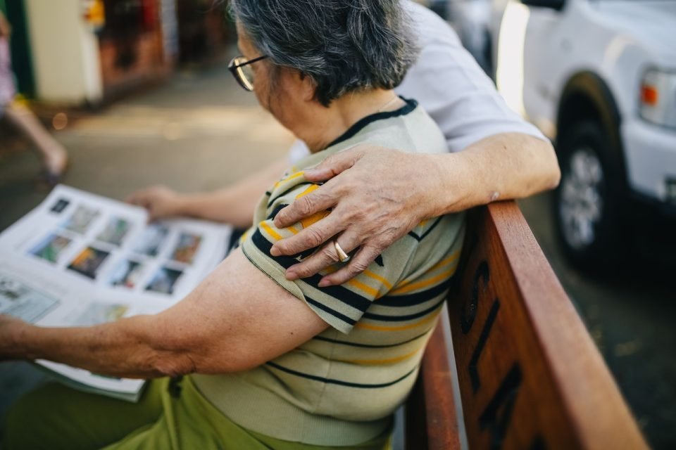 seniors reading a book