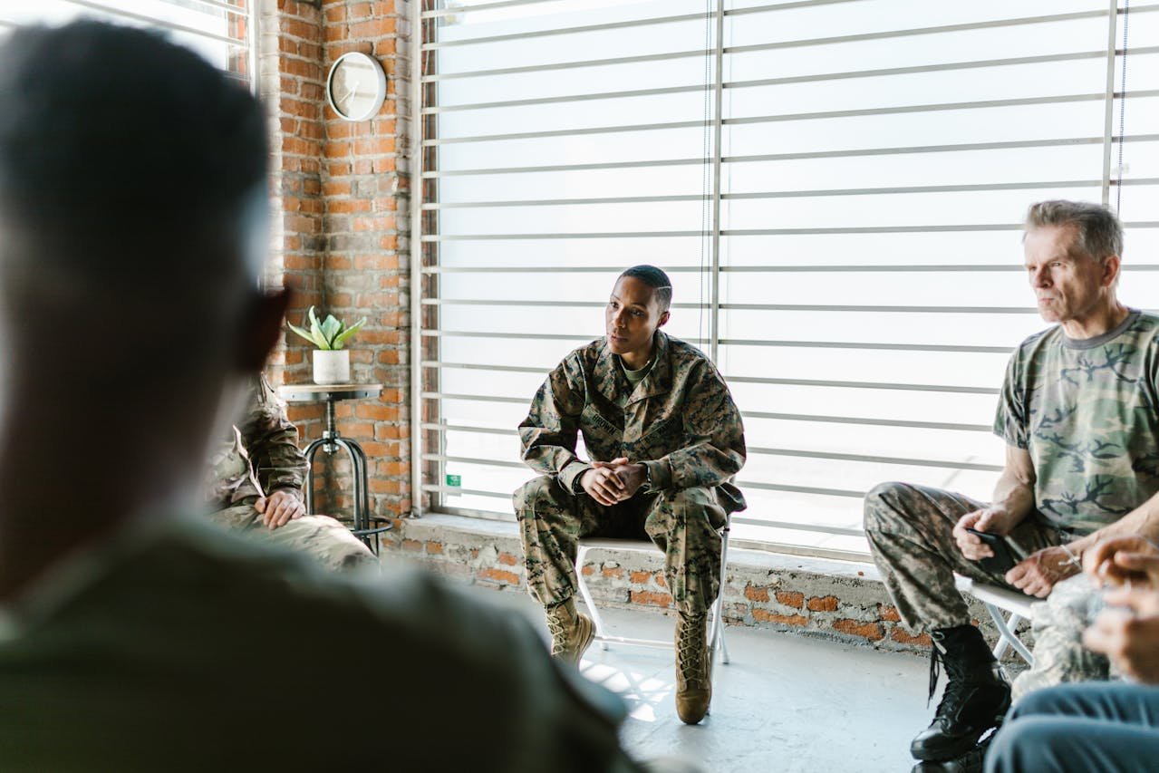 Photo of Soldiers sitting in a circle after having read the Veteran guide to moving to Gilroy