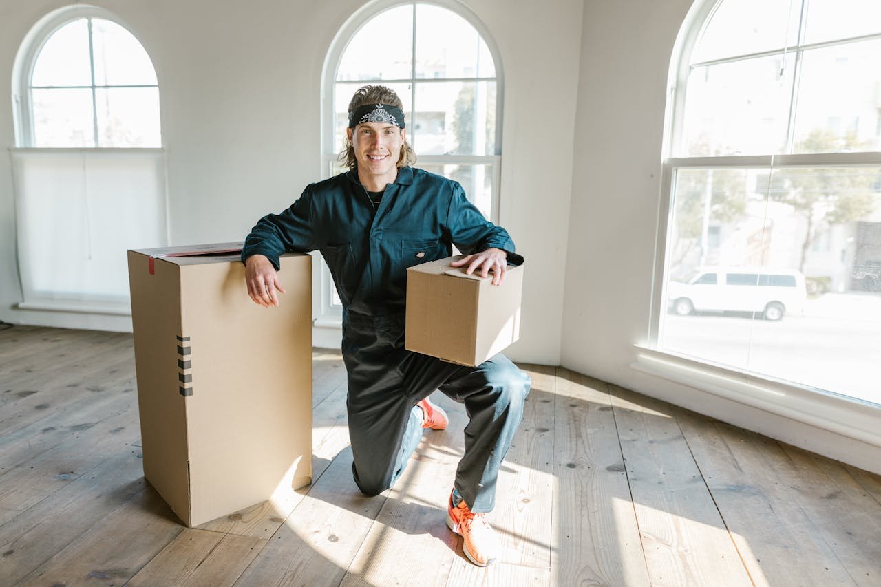 man lifting the boxes