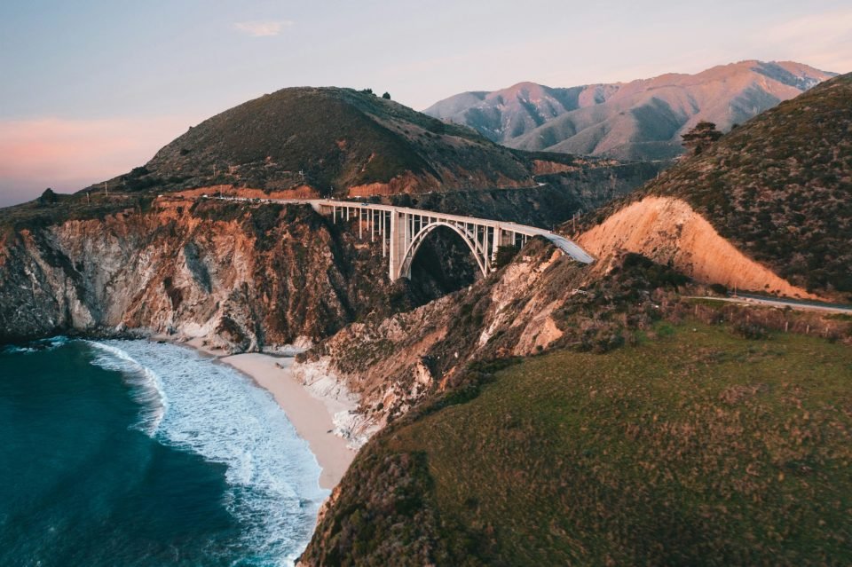 White bridge over the water during daytime