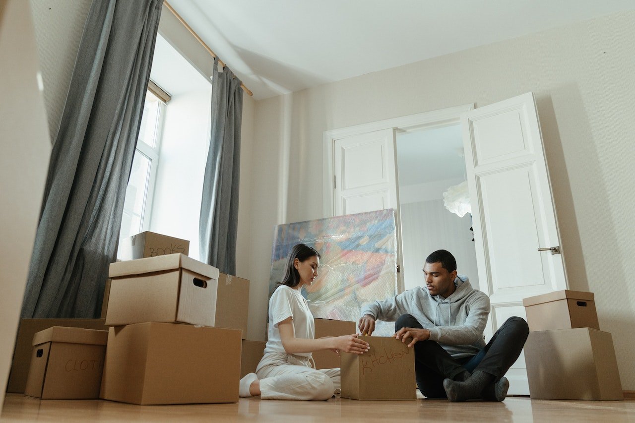 a man and a woman planning a family move
