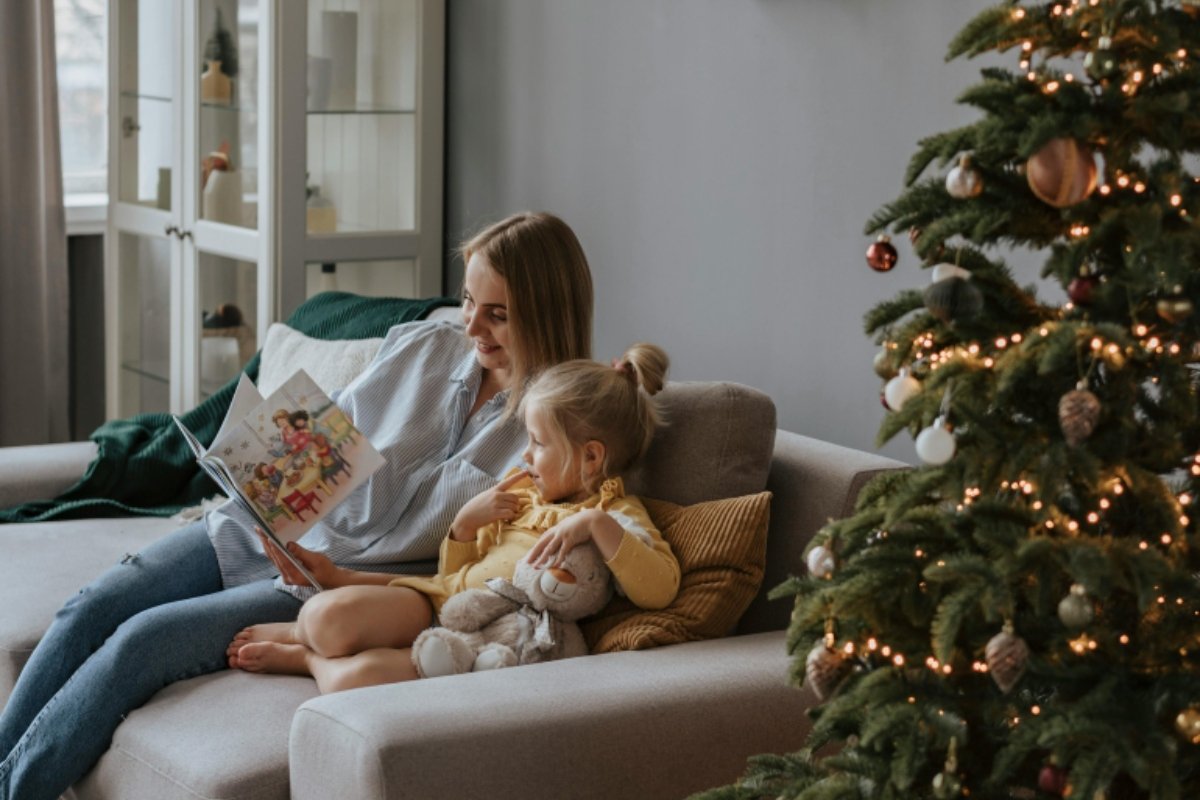 a family with a christmass tree